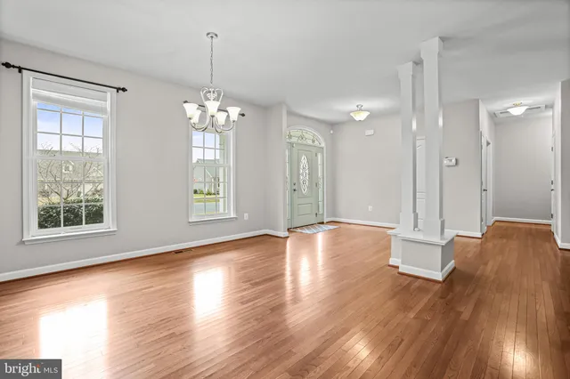 a kitchen with stainless steel appliances a refrigerator stove and microwave