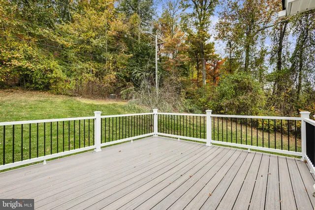 a bathroom with a sink and cabinets