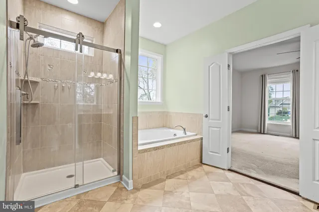 an empty room with a projector and screen