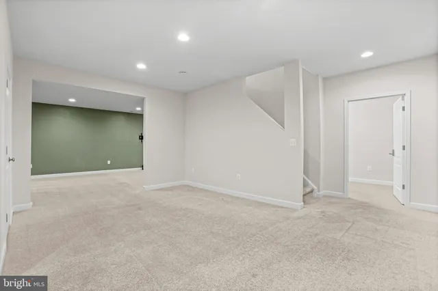 a front view of a house with a garage