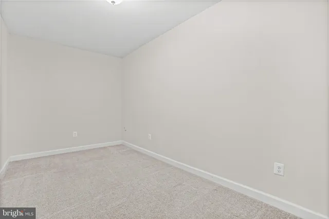 a picture of a room with a white wall and a white wall