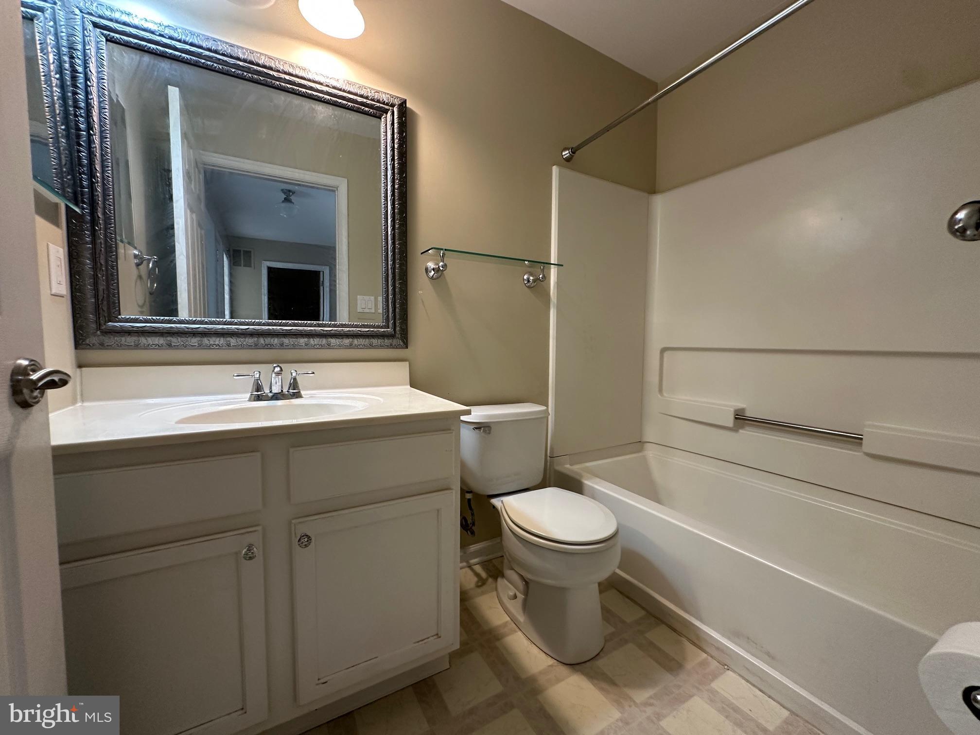 6104 Coventry Way Mount Laurel, NJ 08054 - Photo 16 of 17 a bathroom with a sink toilet and shower