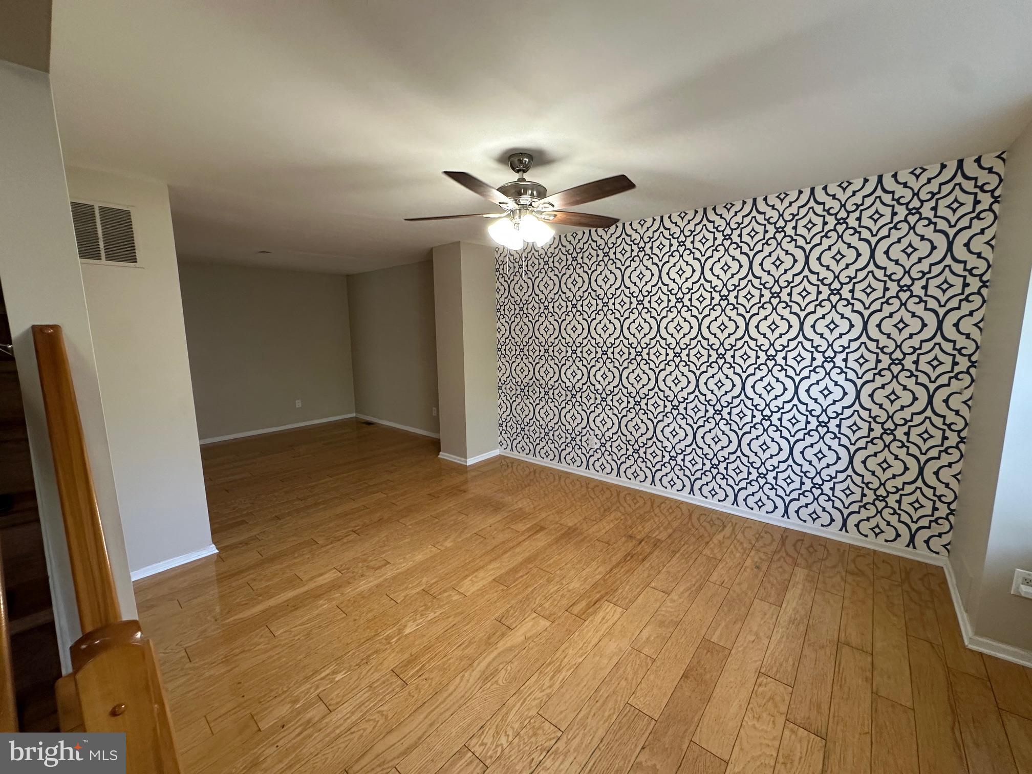 6104 Coventry Way Mount Laurel, NJ 08054 - Photo 3 of 17 a view of a room with a ceiling fan