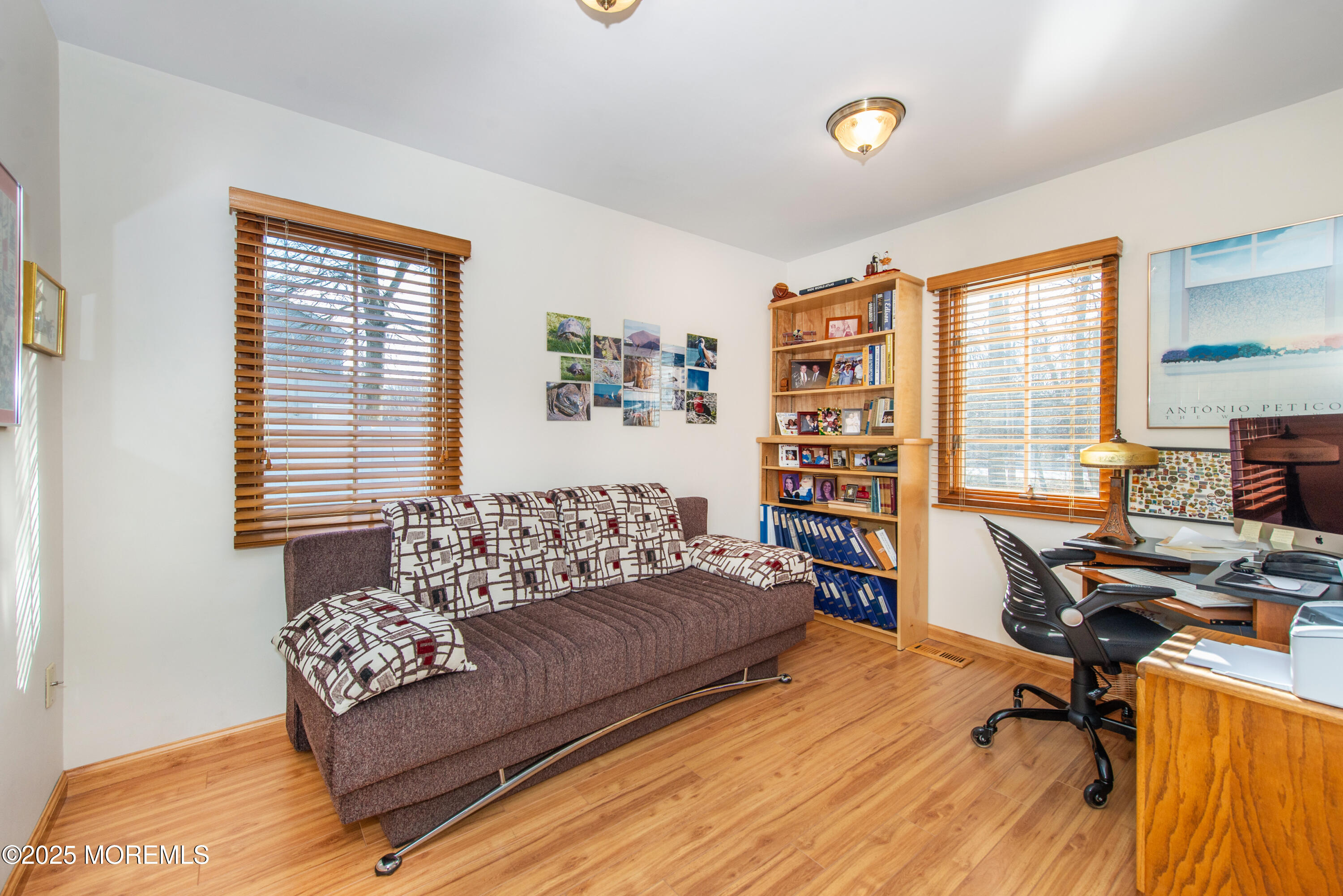 4 Maxwell Lane Manalapan, NJ 07726 - Photo 11 of 32 a living room with furniture and a window
