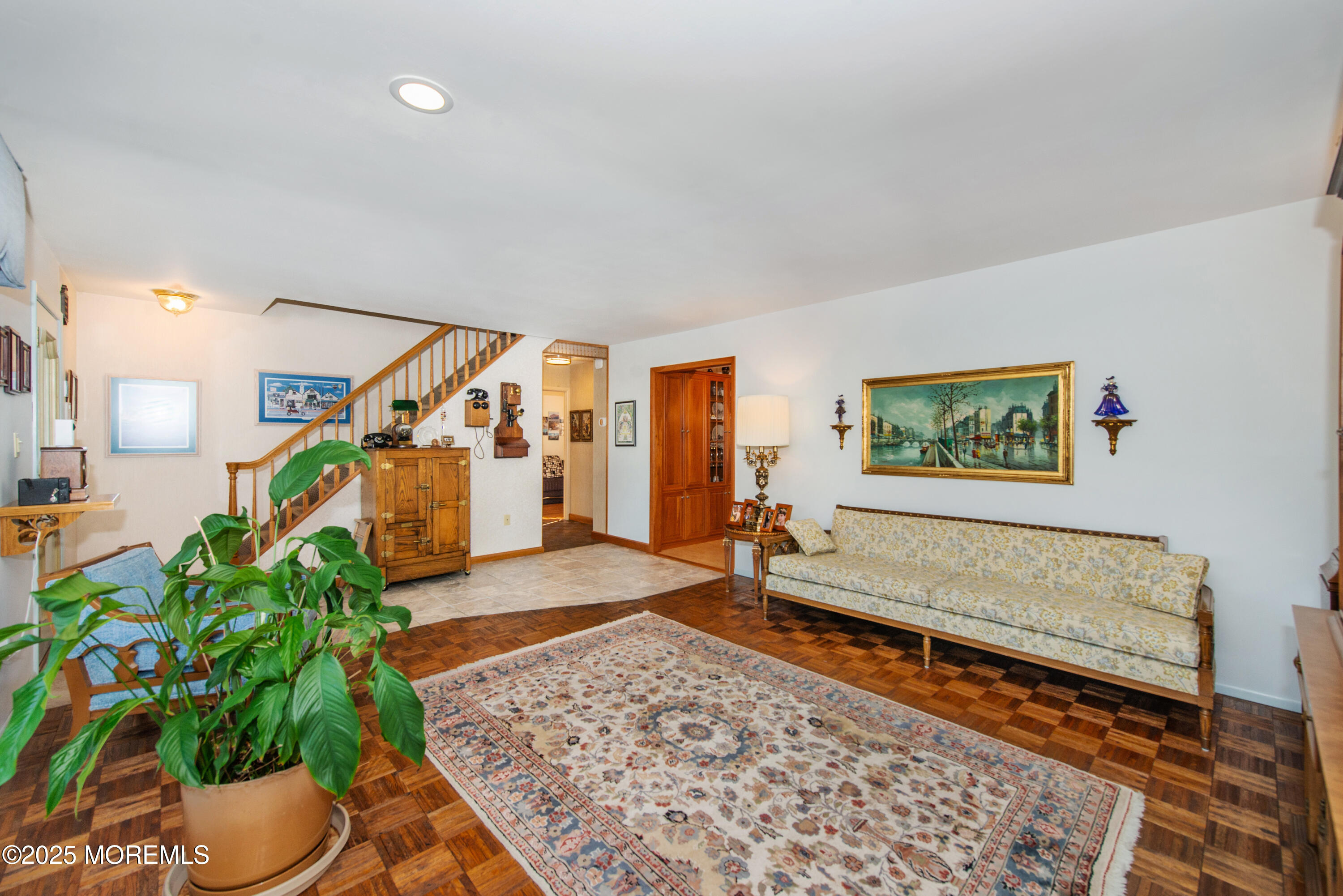 4 Maxwell Lane Manalapan, NJ 07726 - Photo 13 of 32 a living room with furniture and a rug