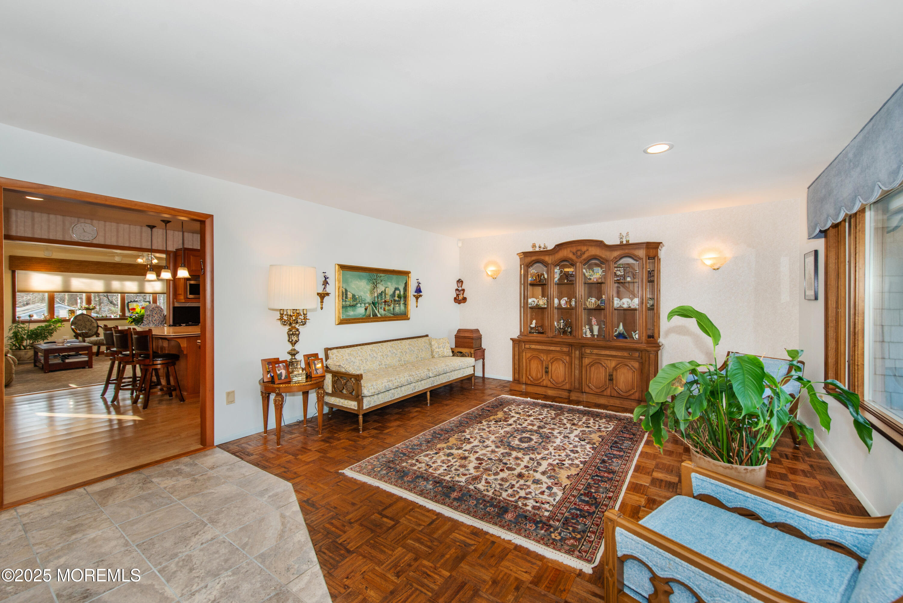 4 Maxwell Lane Manalapan, NJ 07726 - Photo 14 of 32 a living room with furniture and a potted plant
