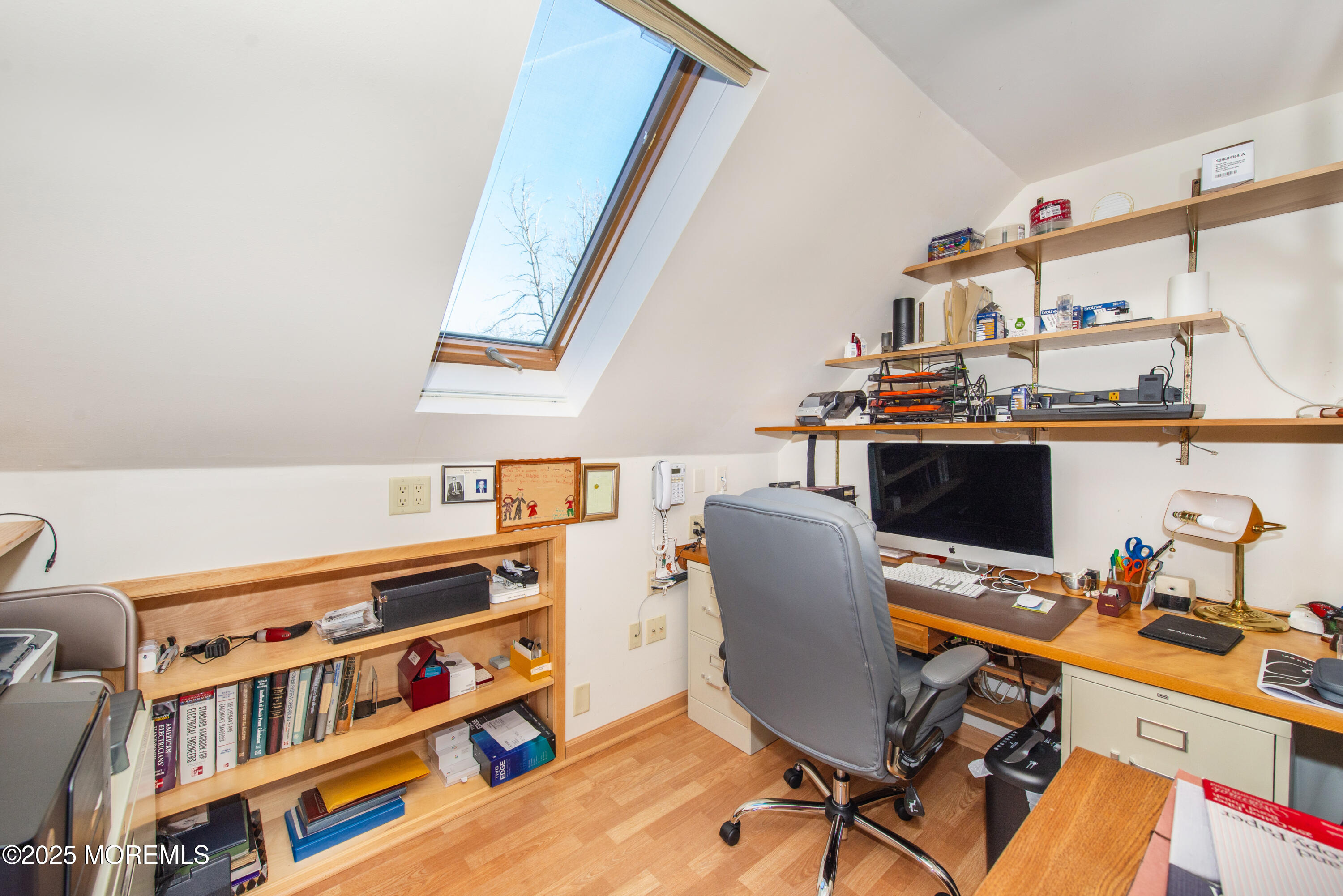 4 Maxwell Lane Manalapan, NJ 07726 - Photo 22 of 32 a view of a workspace with furniture and toys