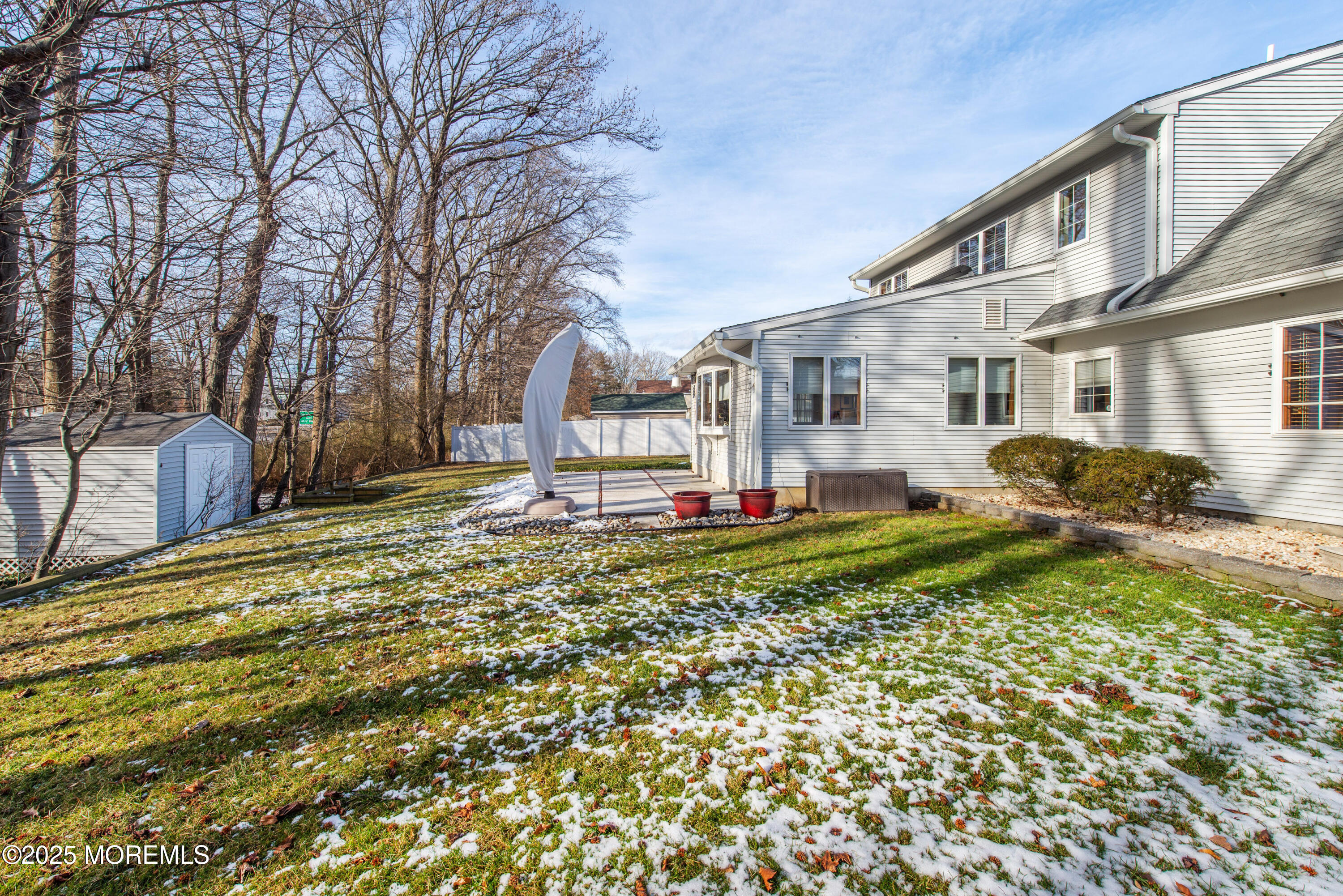 4 Maxwell Lane Manalapan, NJ 07726 - Photo 28 of 32 a front view of a house with garden