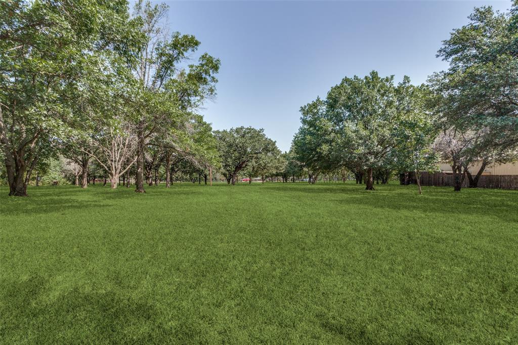 262 Turner Warnell Road Mansfield, TX 76063 - Photo 11 of 17 a view of grassy field with benches and trees all around