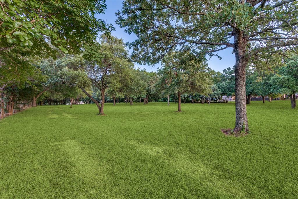 262 Turner Warnell Road Mansfield, TX 76063 - Photo 8 of 17 a view of a park with large trees