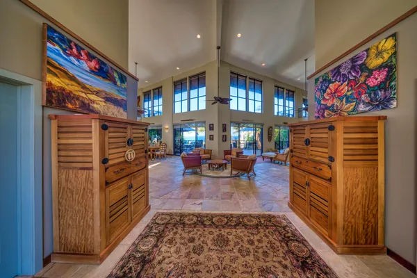 a living room with furniture and a rug