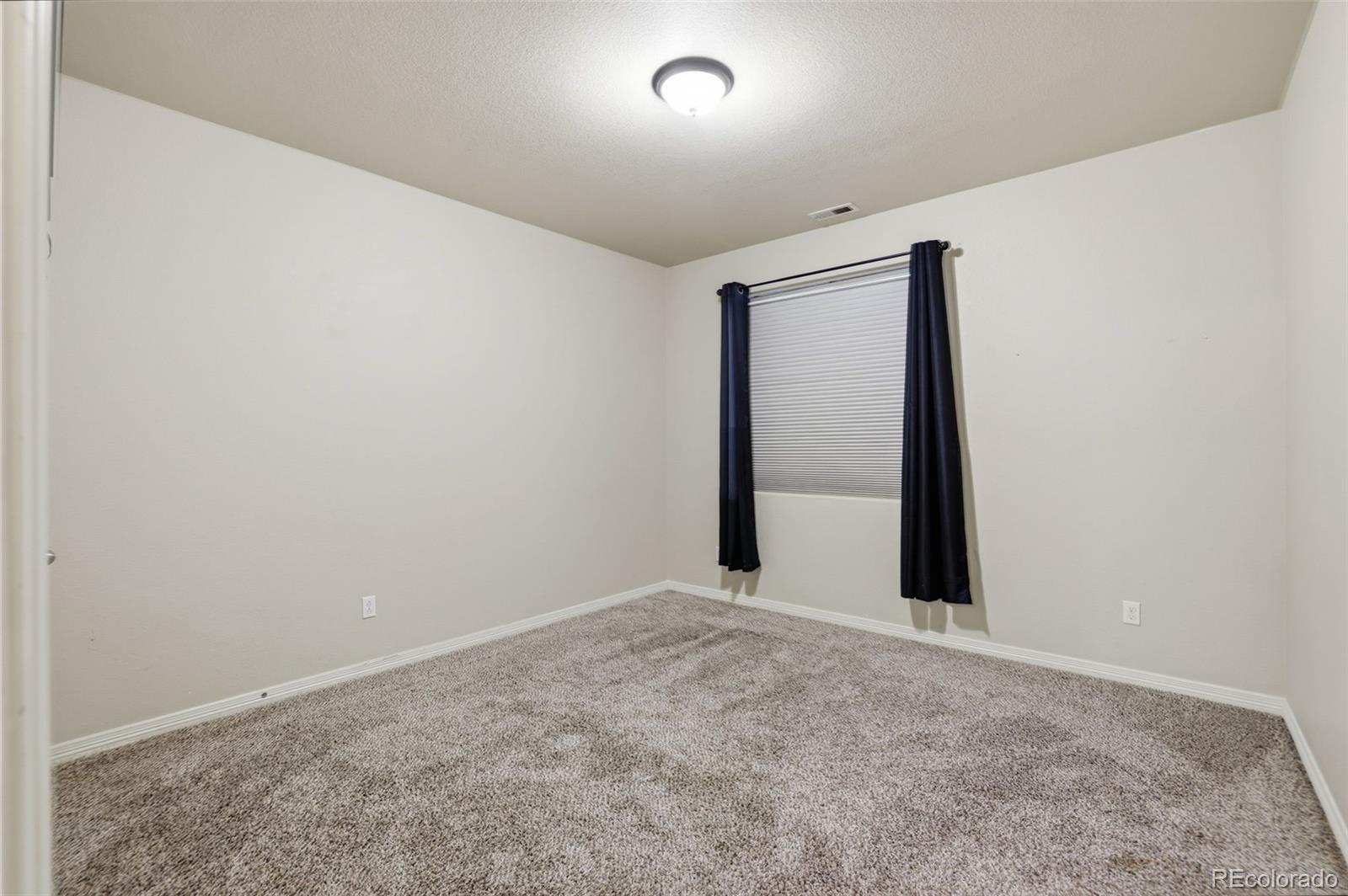 2224 Reed Grass Way Colorado Springs, CO 80915 - Photo 20 of 45 a view of an empty room