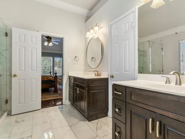 a bathroom with a bathtub and shower