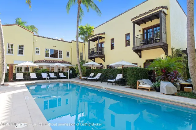 a front view of a house with swimming pool