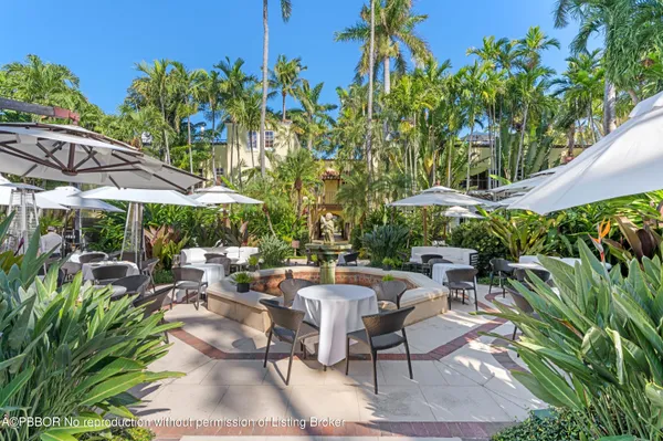an outdoor space with patio and outdoor seating