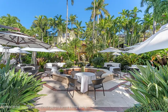 an outdoor space with patio and outdoor seating