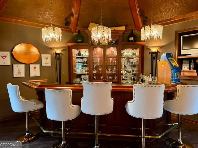 a living room with furniture rug and window