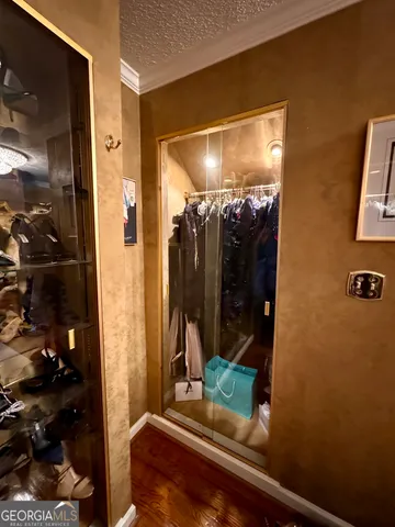 a view of mountain with swimming pool and trees in the background