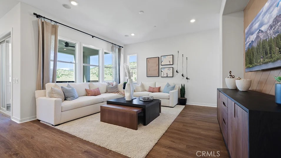 785 Walnut Terrace Montebello, CA 90640 - Photo 11 of 36 a living room with furniture and a flat screen tv