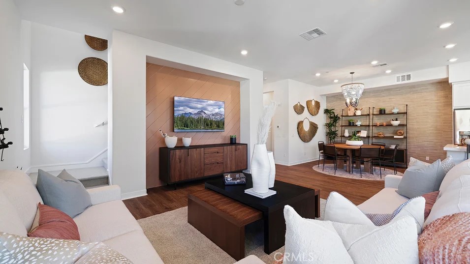 785 Walnut Terrace Montebello, CA 90640 - Photo 12 of 36 a living room with furniture and a flat screen tv