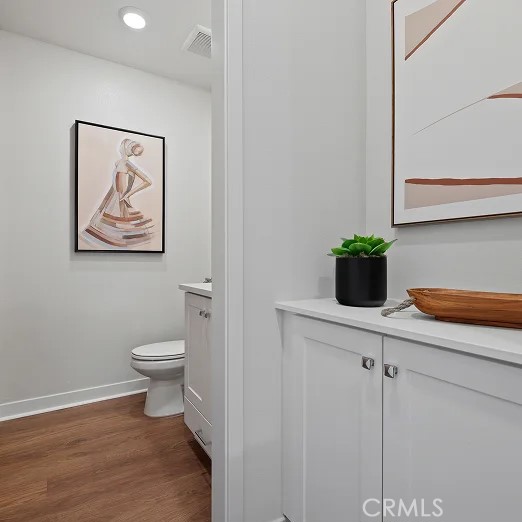 785 Walnut Terrace Montebello, CA 90640 - Photo 13 of 36 a view of bathroom with a toilet and a potted plant