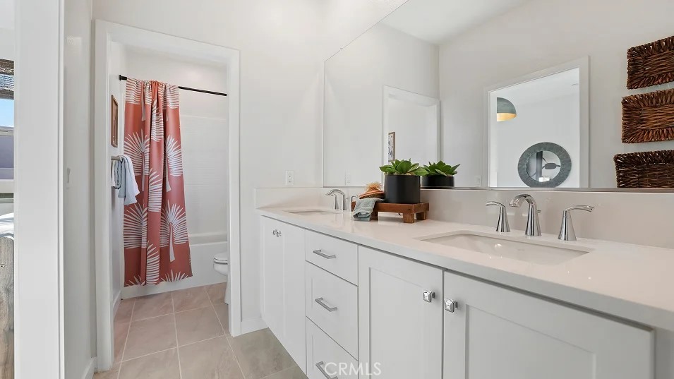 785 Walnut Terrace Montebello, CA 90640 - Photo 22 of 36 a bathroom with a sink and a mirror