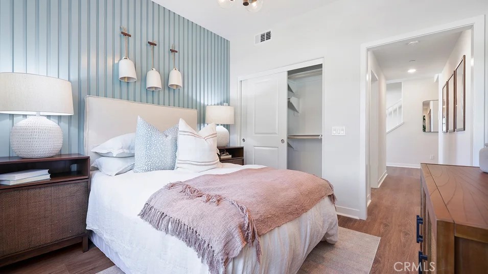 785 Walnut Terrace Montebello, CA 90640 - Photo 27 of 36 a bedroom with a bed and a lamp