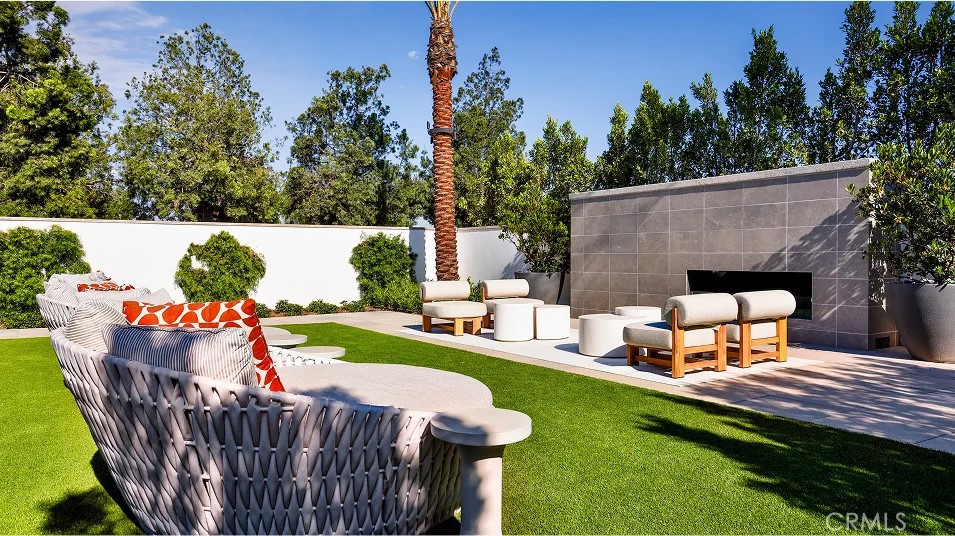 785 Walnut Terrace Montebello, CA 90640 - Photo 34 of 36 an outdoor sitting area with furniture and garden