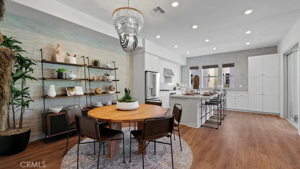 785 Walnut Terrace Montebello, CA 90640 - Photo 8 of 36 a view of a dining room with furniture and wooden floor