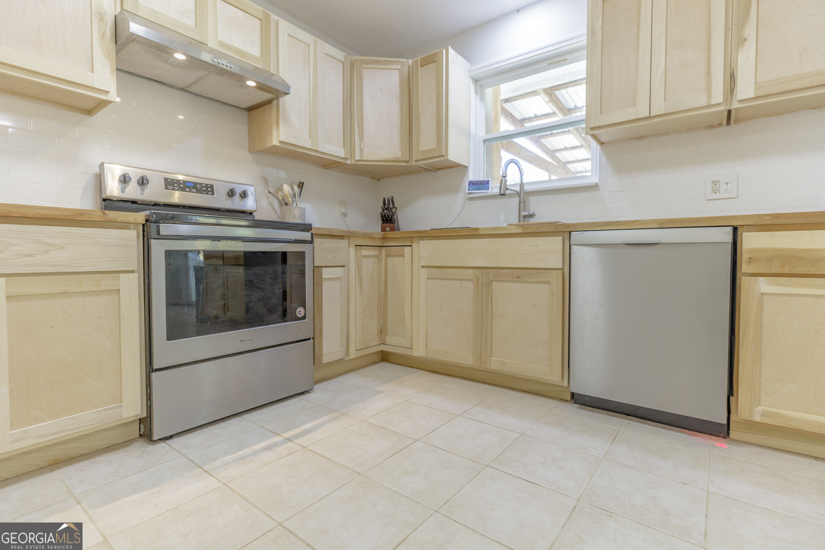 1144 Ridgeway Road LaFayette, GA 30728 - Photo 23 of 66 a kitchen with cabinets appliances and a window