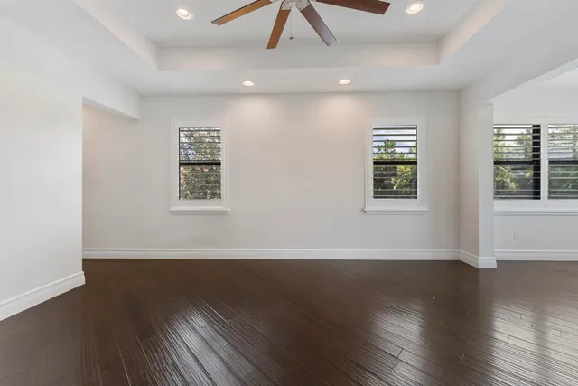 a large bathroom with a granite countertop sink mirror and shower