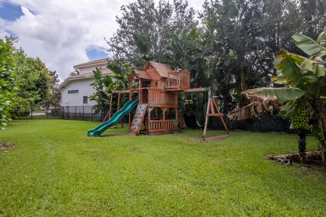 a very nice looking room with lots of furniture and toys