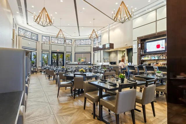 an aerial view of a house with a garden