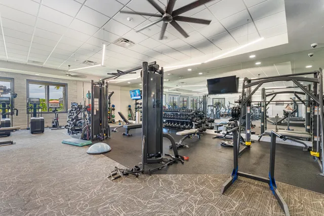 a view of a swimming pool with a yard