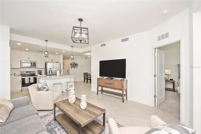 a bedroom with a bed and a lamp