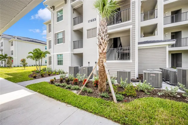 a view of livingroom with furniture and hallway
