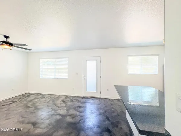 an empty room with windows