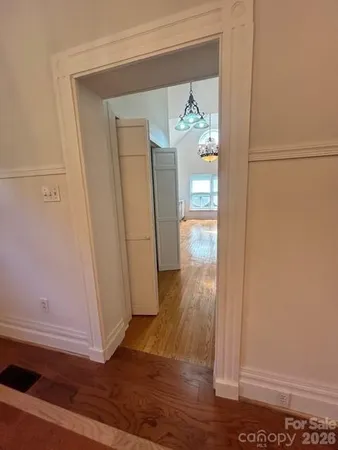 a view of kitchen with wooden floor