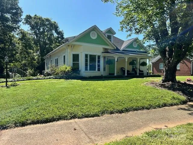 a view of a house with a garden
