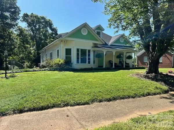 a view of a house with a garden