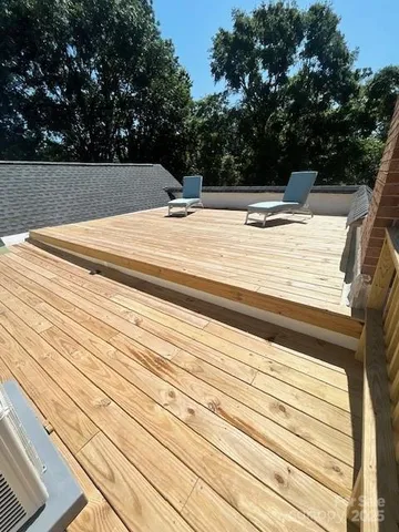 a view of swimming pool with trees
