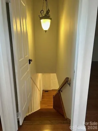 a view of a livingroom from a balcony