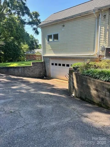 a view of backyard with outdoor space