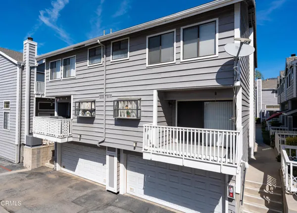 a view of a house with a deck