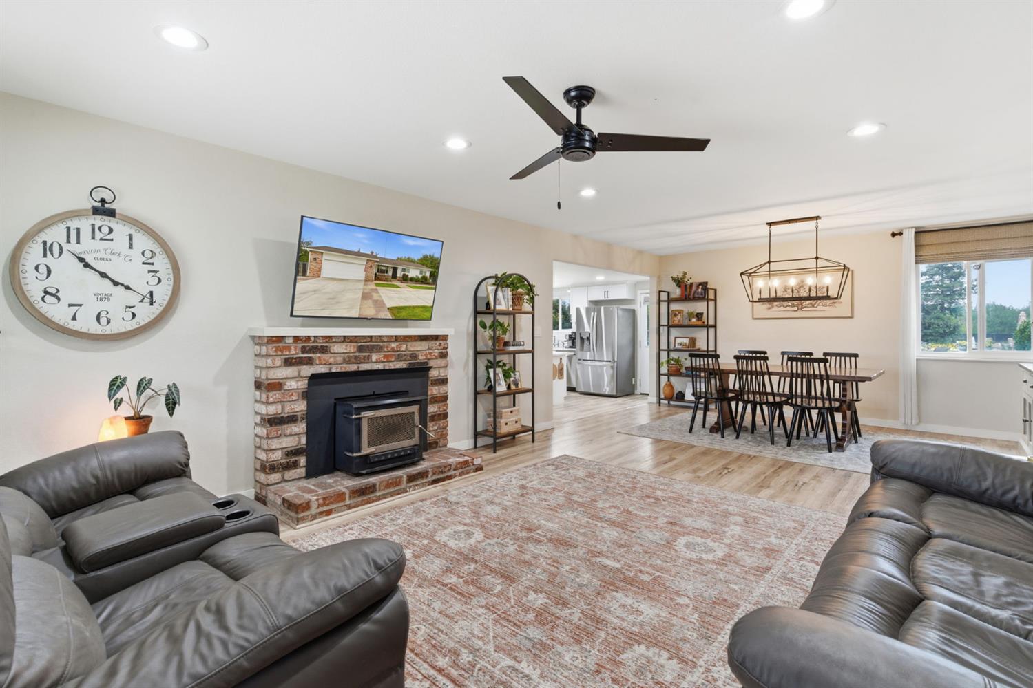 15581 French Camp Road Ripon, CA 95366 - Photo 8 of 54 a living room with furniture and a fireplace