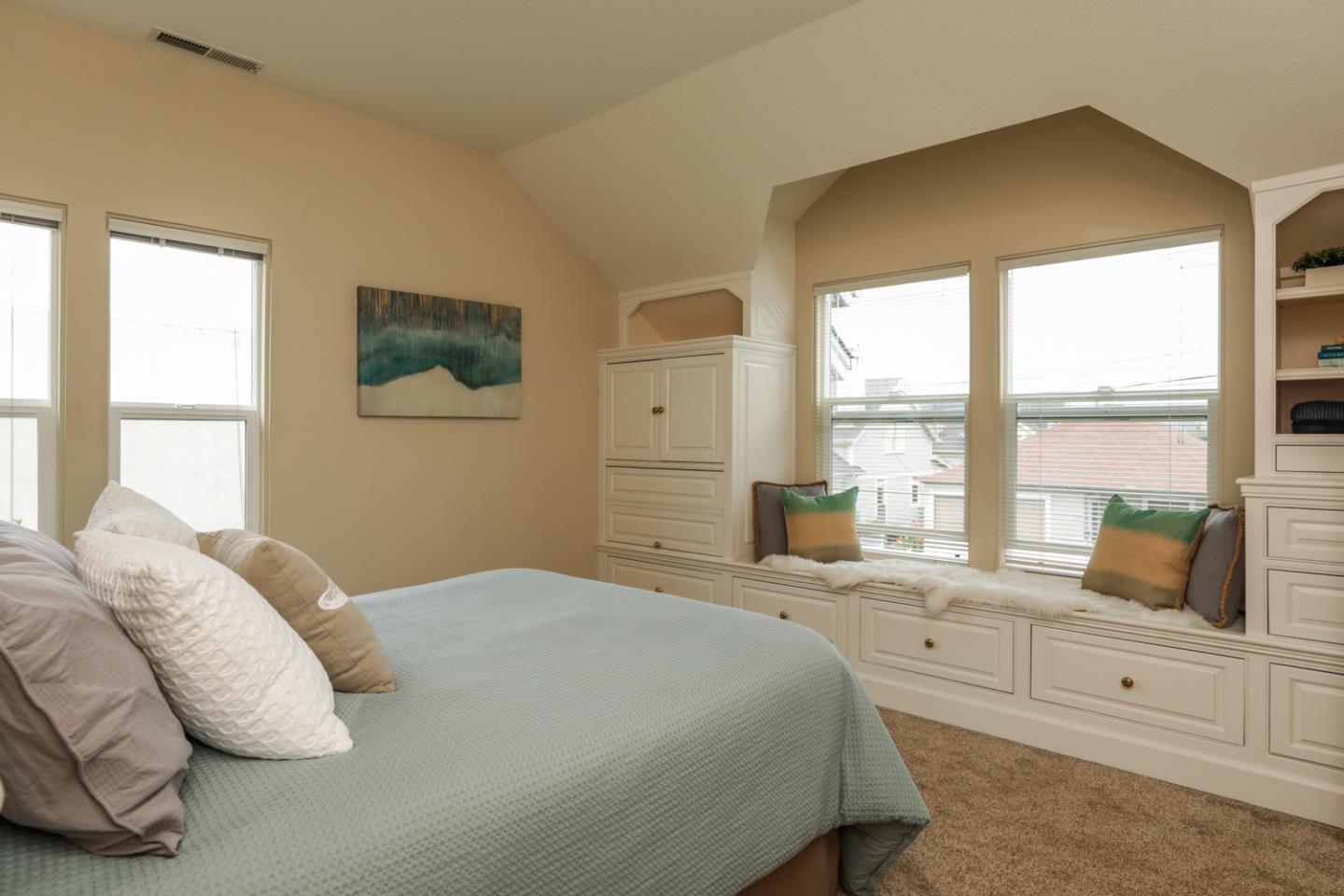 111 Fairview Avenue Capitola, CA 95010 - Photo 13 of 29 a bedroom with a bed and a large window