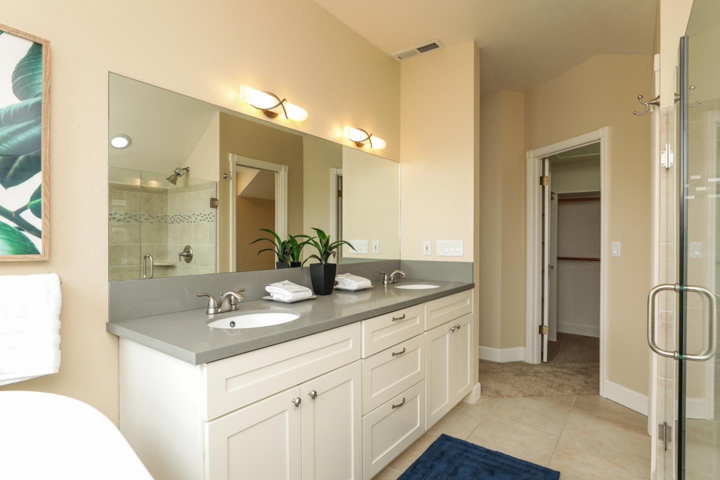 111 Fairview Avenue Capitola, CA 95010 - Photo 15 of 29 a bathroom with a double vanity sink mirror and double