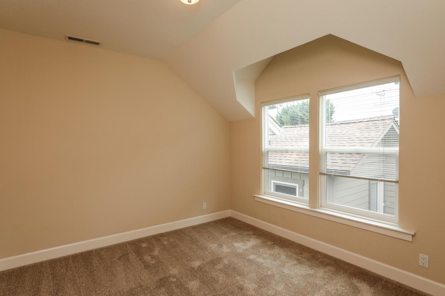111 Fairview Avenue Capitola, CA 95010 - Photo 21 of 29 an empty room with a window