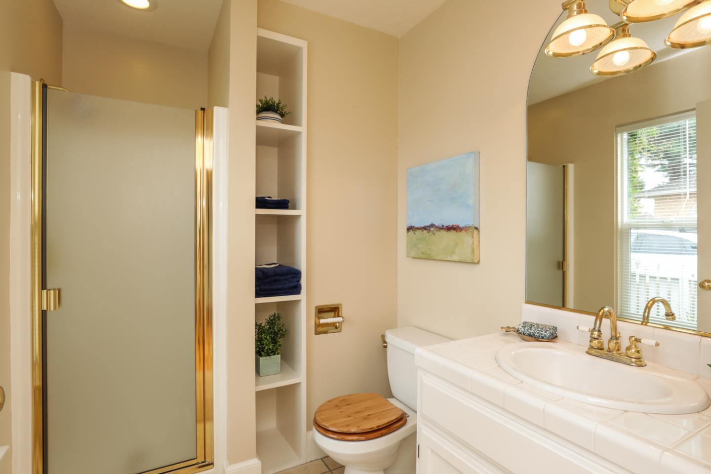 111 Fairview Avenue Capitola, CA 95010 - Photo 23 of 29 a bathroom with a sink a toilet and shower