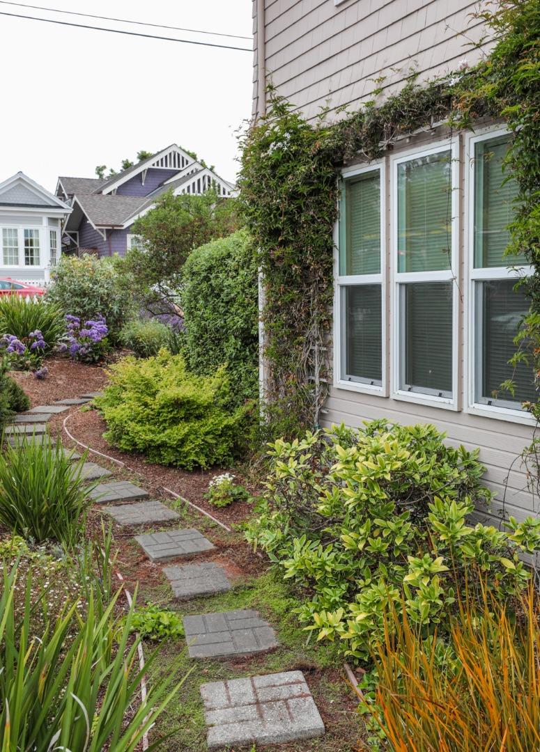 111 Fairview Avenue Capitola, CA 95010 - Photo 25 of 29 a view of a house with a garden